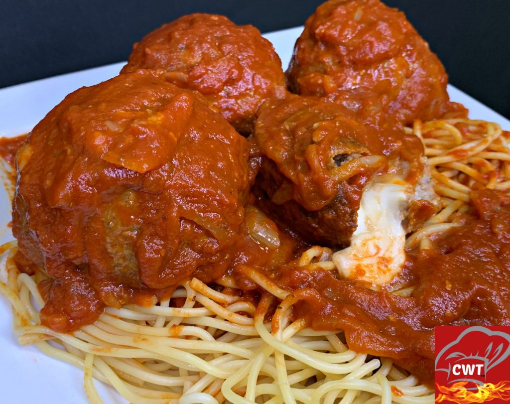 Mozzarella Stuffed Meatballs Recipe delicious tender juicy perfectly seasoned meatballs filled with melted gooey fresh mozzarella cheese. Satisfying cheese pulls with every bite.