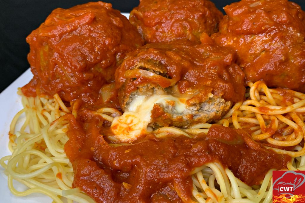 zarella Stuffed Meatballs Recipe delicious tender juicy perfectly seasoned meatballs filled with melted gooey fresh mozzarella cheese. Satisfying cheese pulls with every bite.